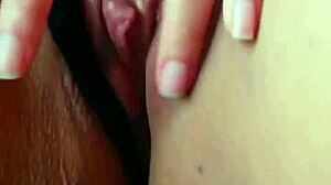 Amateur brunette Morocha masturbates on phone with big clit and natural tits