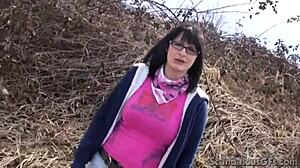 Outdoors amateur teen with perky tits and glasses gives a blowjob