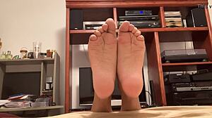 A video by a Latino gay man shows off his feet with toes and soles