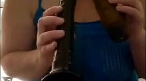 busty milf brunette sucking bbc dildos while masturbating