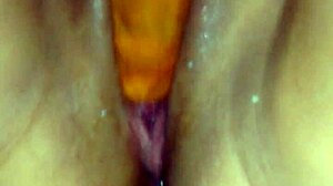 Does my girlfriend try her first dildo for intense pleasure?