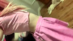 Beautiful Young Girl Performs Striptease in Pink Outfit