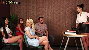 Clothed femdom babes jerk colleague's cock