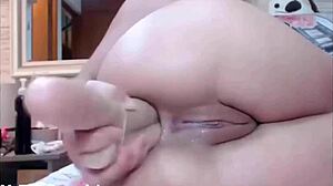 cam girl toys her sweet ass with anal toys