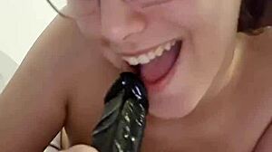 Sucking And Riding Dildo In Cowgirl Position