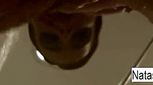 Busty natasha nice creates a fun and sexy black light video shoot