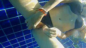 three panties stuffed in pussy, fucking black dildo in public pool