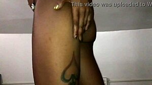 This bold closeup shows a black asshole in tight panties and thong, with intense teasing