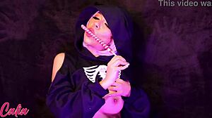 Enjoying a lollipop in a playful manner