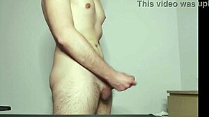 Young amateur teen masturbates solo with cock in hand during massage