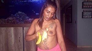 Topless Desi Squeezes Boobs While Sucking and Deepthroating Banana Kinkily