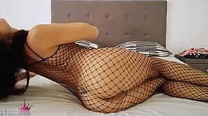 Girl in mesh bodystockings fucks sensually after work, cum on pussy.