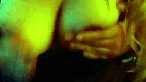 a busty blonde girlfriend films homemade videos with her friend, showcasing big tits and ass in amateur couple compilations.