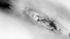 this busty milf is caressing her big tits in a homemade close-up, she's reaching orgasm