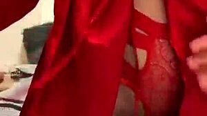Brunette in red lingerie plays with herself?