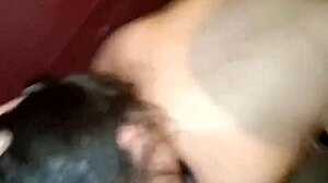 Two guys share the naughty brunette in the swing house.