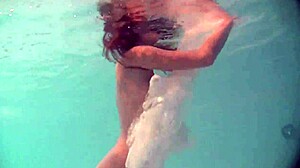 Natasha's underwater striptease: a short Russian teen’s exotic pool trip