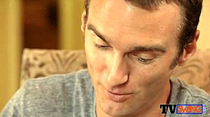 A stunning hottie shares a gentle kiss with her best friend