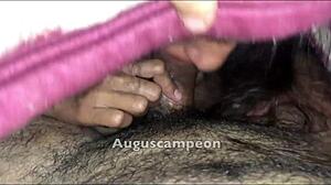 Big tits milf casually sucking on a throbbing cock in the scene.