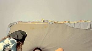 Dominatrix engages in assplay and fingering with submissive guy