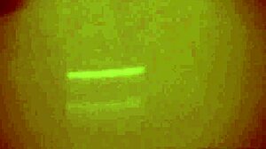 two teen lesbians play with camera in bedroom