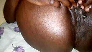 Ebony Charry Ray Rubs Thighs and Ass Playing with Shaved Pussy