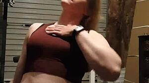 Blonde milf bodybuilder undresses teasingly in gym, ripping leggings