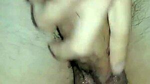 Young asian girl jerks off in bathroom, cum everywhere