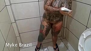 Tattooed Woman Enjoys a Relaxing Session with Companions