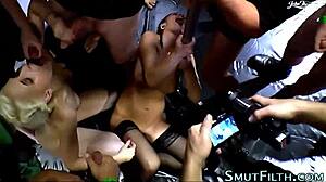 busty beauty gets face covered in wild group blowbang action