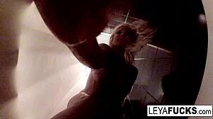 leya falcon brings a camera into the shower for a nude solo show.