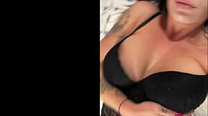 Tattooed mistress gives orders for her big-boobed slave