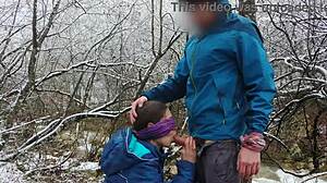 Petite brunette swallows cum outdoors by mountain river