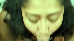 Latina wife gives close-up blowjob.