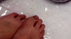 I slowly remove my nylon stockings before a steamy shower tease.