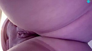 she spreads her shaved pussy for close-up play