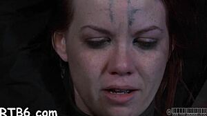 Painful clamps on her milk sacks hurt so good