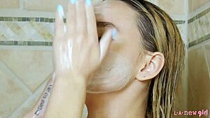 Small booby blonde gets shower in a hot scene