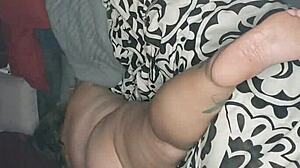 gaping her tight pussy wide with a pink dildo