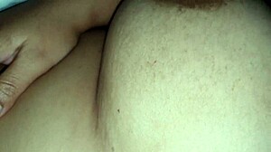 Squeezing my stepmom's big nipples while she moans