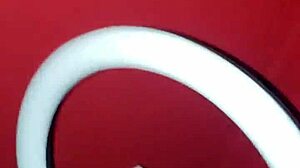 gaping her tight pussy wide with a pink dildo