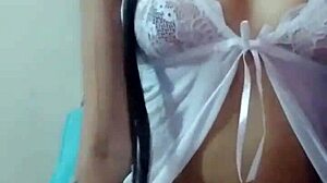 A young LATINA TEEN is ALONE in her HOME, quietly exploring