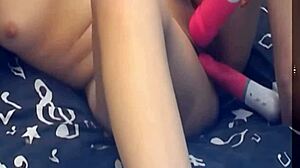 This girl is rocking two vibrating dildos on webcam.