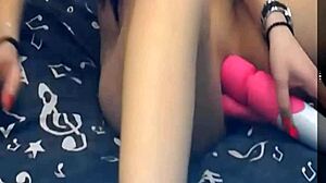 This girl is rocking two vibrating dildos on webcam.