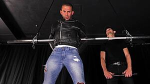 Muscle hunk gets tied up and teased in gay BDSM scene