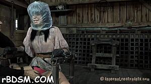 Brunette woman explores self-pleasure with a toy in a private moment.