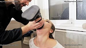 Nataly Gold performs extreme deepthroat with huge dildo in bondage