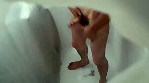 Hidden camera catches roommate pounding ass with a plunger in wild anal action.