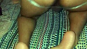 Riding thick dildo in close-up view with rough intensity