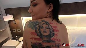 the tattooed bombshell adel asanti is sucking a big cock